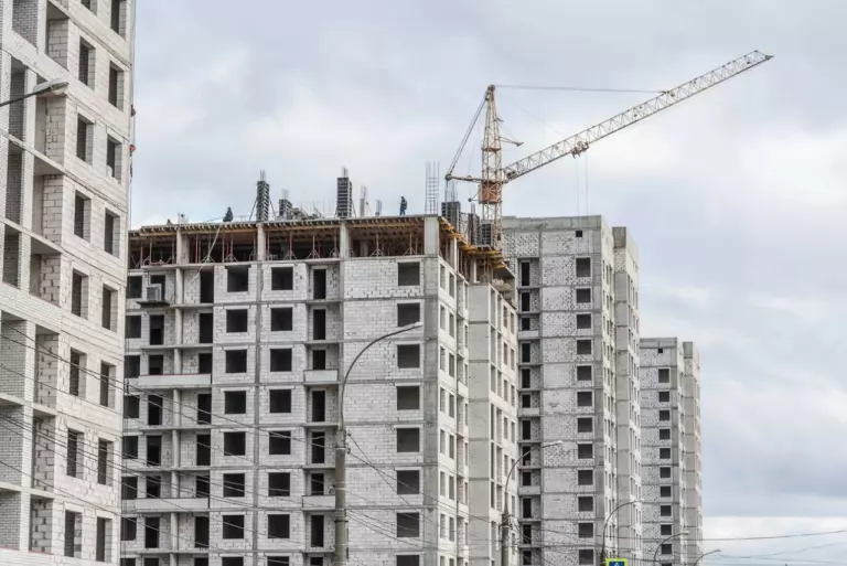 Как применять повышающие коэффициенты земельного налога при разделе (выделе) участков под строительство жилья